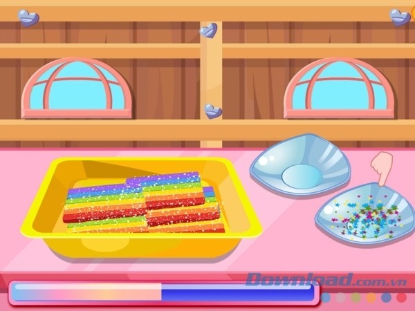 Rắc hạt kẹo cốm trang trí bánh khi ra lò