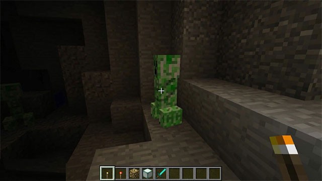 Mod sử dụng đuốc để chiếu sáng và chiến đấu trong Minecraft