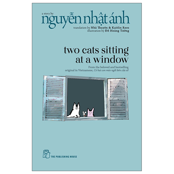 Two Cats Sitting At A Window